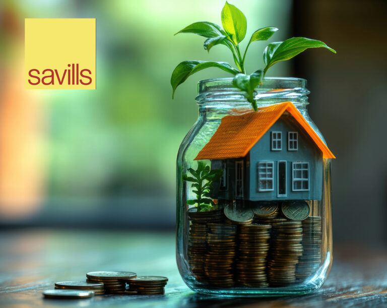 A home with a plant on stacked coins within a small glass jar, Savills logo
