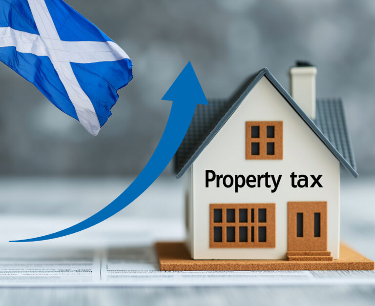 A modle home with an arrow pointing upwads and the Scottish flag