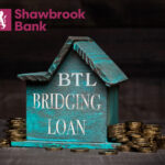 Shawbrook Bank BTL bridging loan concept with house model and coins.