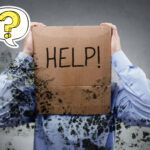 A person with brown paper bag on their head with the word Help, mould surrounding the person and a question mark sign