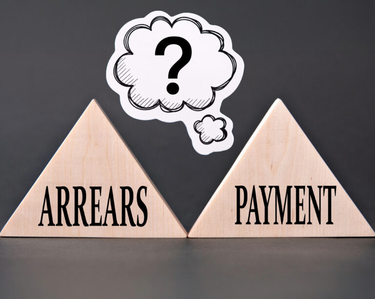 Two triangles with arrears and pament text and a question mark in a ubble sign