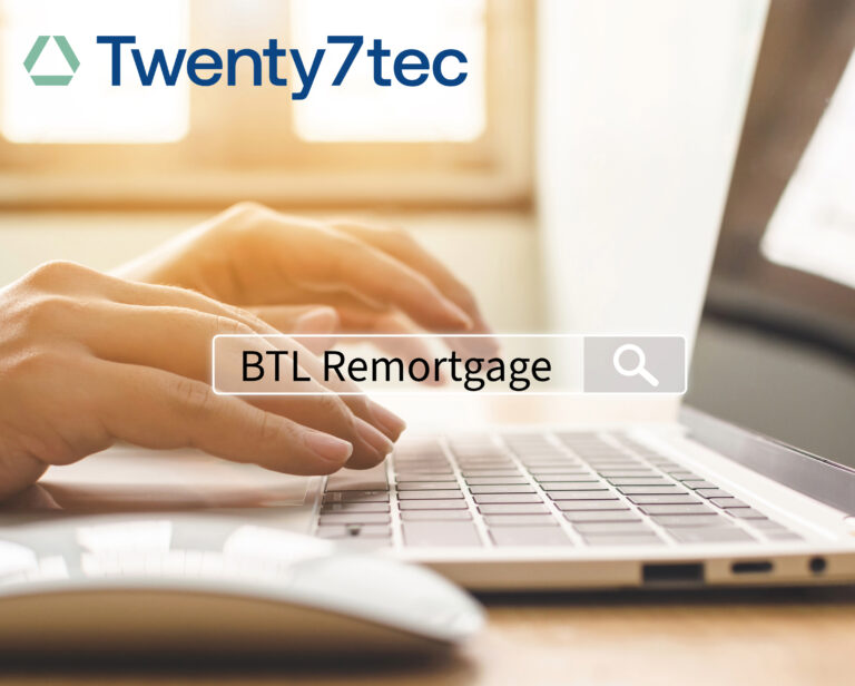 A person typing on a laptop