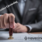 A businessman stamping papers, Selective licensing