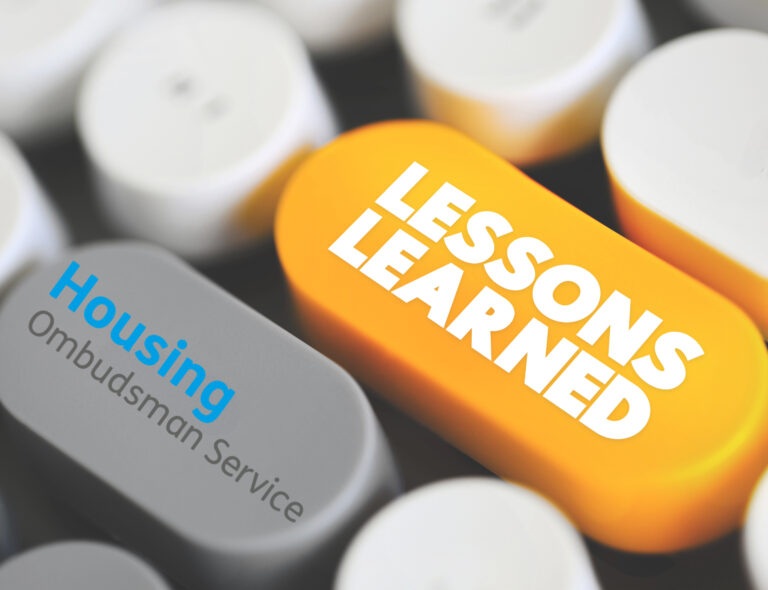 A keyboard with a key saying Lessons Learned and Housing Ombudsman