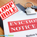 Loop Hole, a house on a keyring laying on an eviciton notice