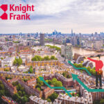 A backdrop of the City of London and a person