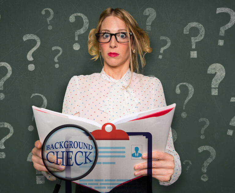 A womena holding a tenancy agreeemnt and questions marks in the background