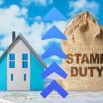 a blue house next to a bag that says stamp duty with a blue arrow