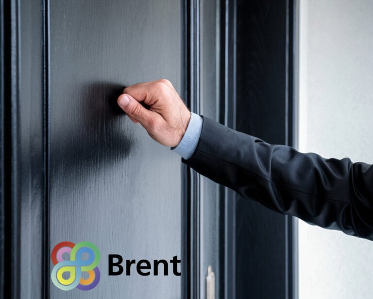 Businessman knocking a black door
