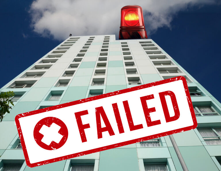 Tower block with a fire alarm on top and text failed with a X