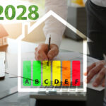 EPC graph surrounded by the shape of a home, 2028 and a person writing on a desk