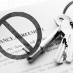 Keys and a stop notice over a tenancy agreement