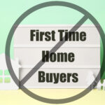 First time home buyers in a grey stop circle, model white house and figures of a person with children