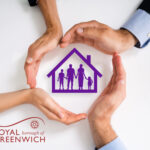 Hands in a circle with a purple outline of house and people figure inside