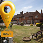 A yellow location pin above the words Rent, a row of houses in Buckinghamshire in the background