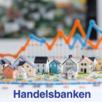 model houses with graph lines above