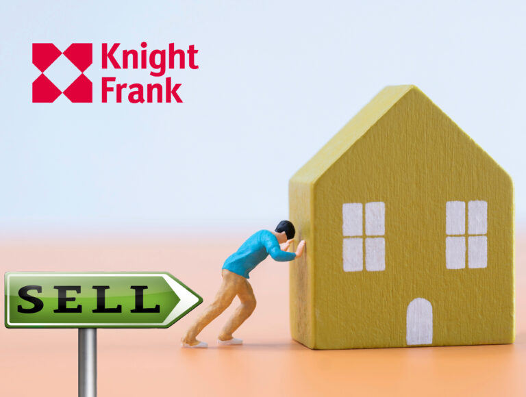 A man figure pushing a model house, Sell sign and Knight Frank logo