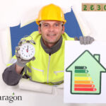 A construction worker holding an alaram clock and an EPC graph