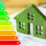 Green model house next to an EPC graph