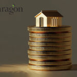 Coins stacked and a model house on top, Paragon logo