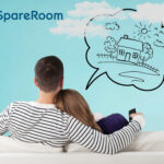 A couple sitting on a sofa together with a house in a bubble and Spare room logo