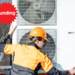 engineer installing heat pumps