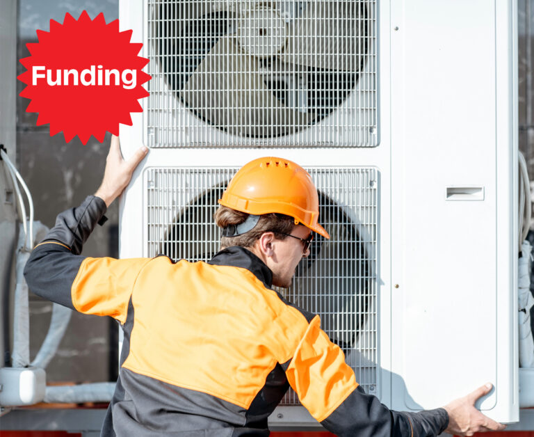 engineer installing heat pumps