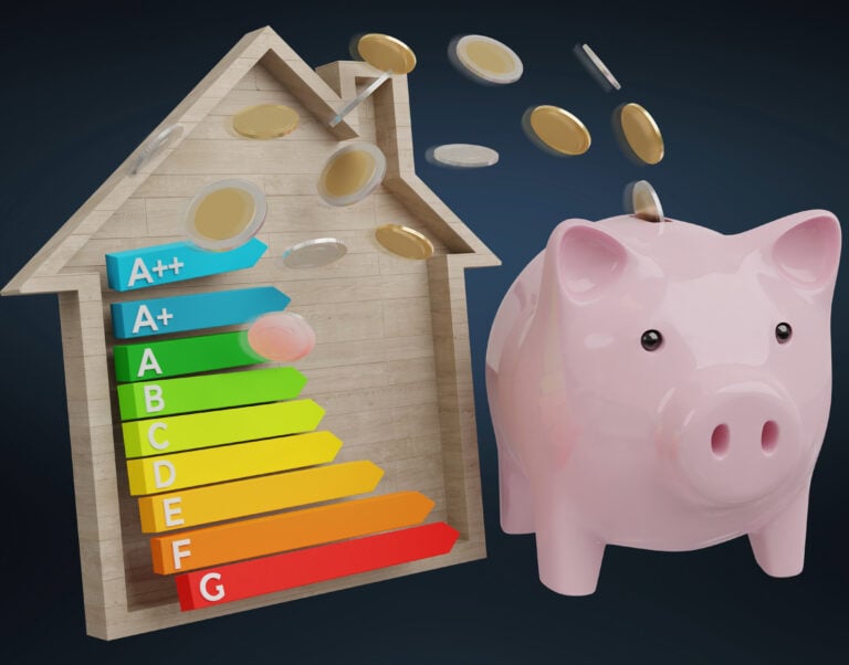 a wooden slice of a house with EPC grades and money flowing from a piggy bank