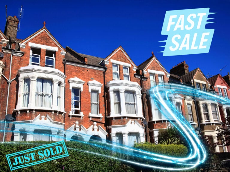 Row of houses with just sold and for sale text