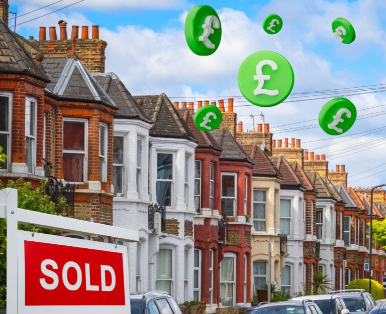 Terraced houses with a sold sign and flying pound signs