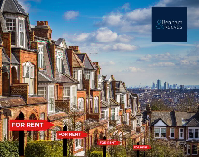 Row of houses in London with for rent signs