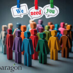 multi coloured wooden figures with text We need you