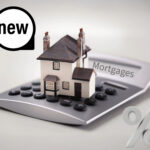 House on a calculator and a percentage sign and a new label