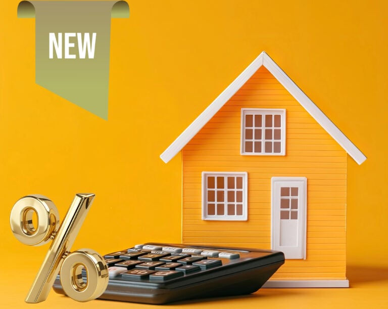 Yellopw house on yellow background with a calculator and percentage and new sign