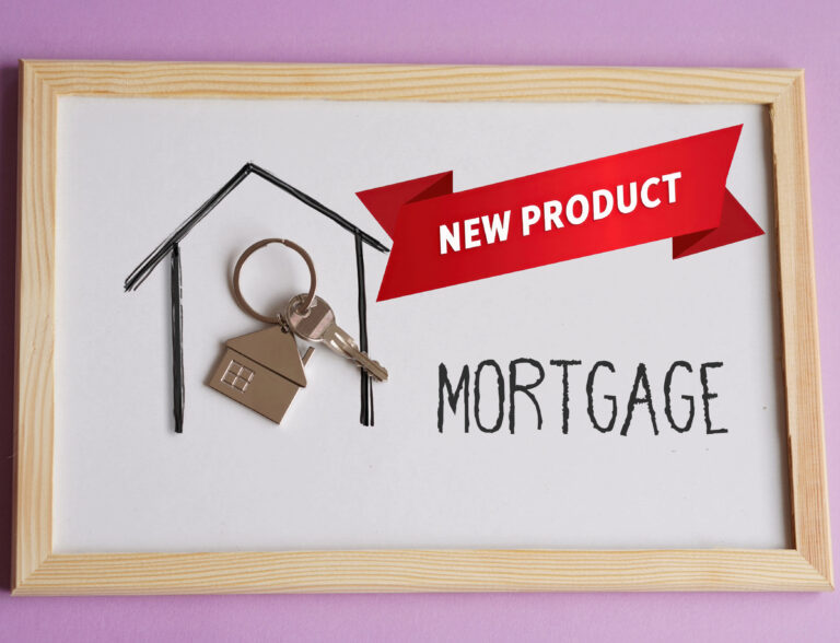 Whiteboard with a drawn house and keys and the word mortgage with a label New Product