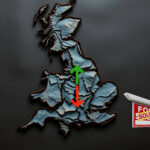 Map of England on black background with arrows pointing north and south and a sold sign
