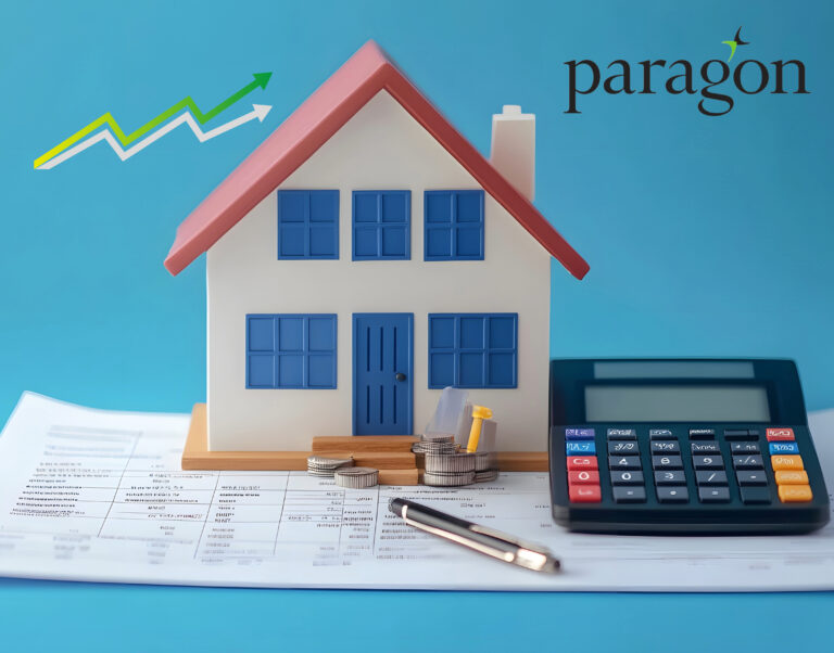 A model house next to a calculator and pen sitting on a spreadsheet, paragon logo