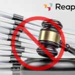 A gavel with red warning circle covering and official papers in the background