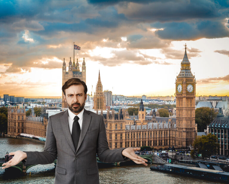 Businessman with hands open with the Houses of Parliament in the background
