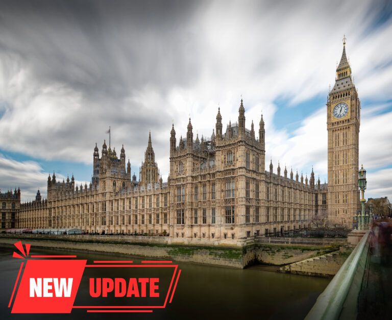Houses of Parliament and new update sign for renters rights bill