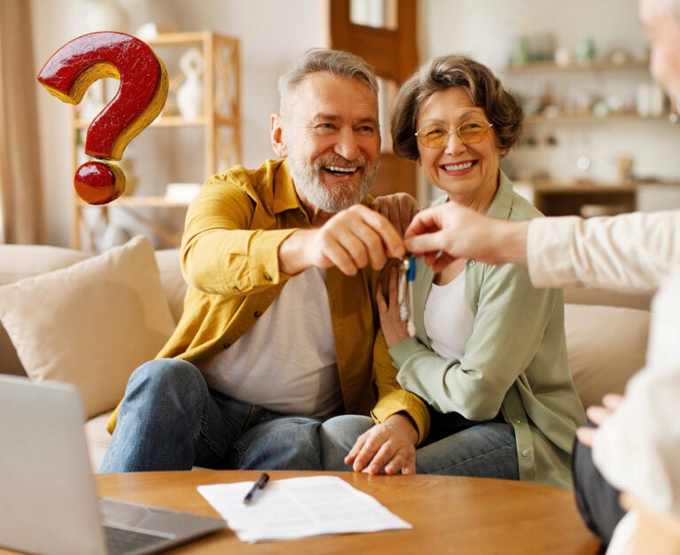 Retired tenenats being handed keys to a house and a question mark
