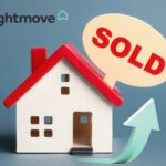 White house with red roof, arrow pointing upwards, sold sign, and Rightmove logo
