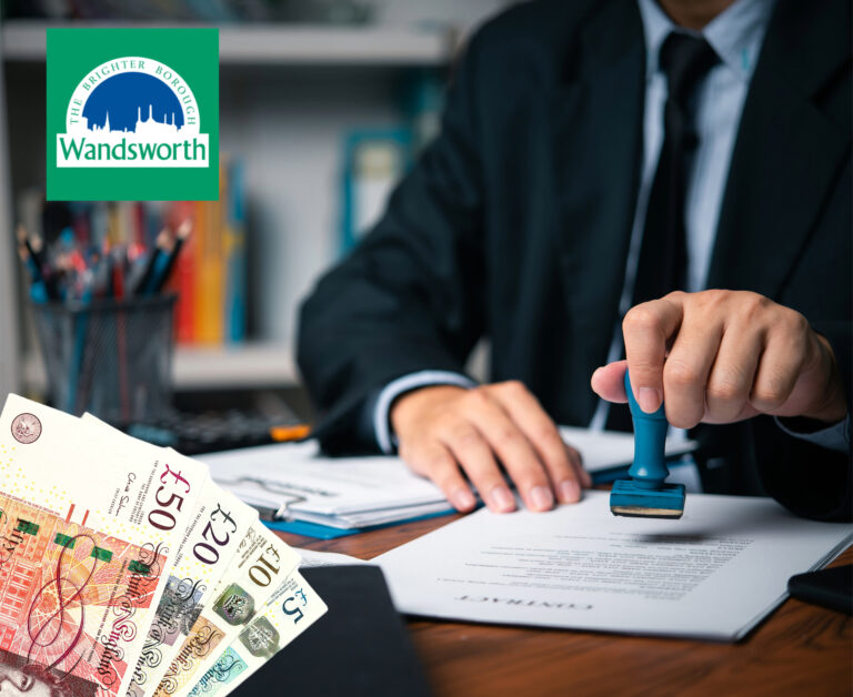 UK notes in front of a desk where a businessman is stamping papers