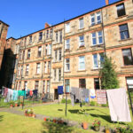 shared garden with HMO houses in the background