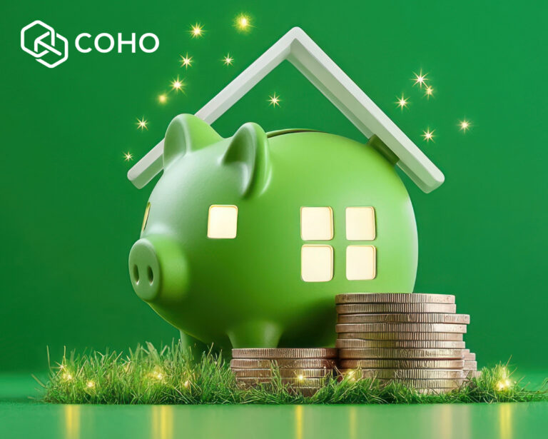 Green piggy bany with house windows and a roof over it with coins