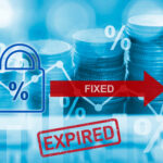 Expired fixed-rate mortgage concept with coins and percentage symbols.