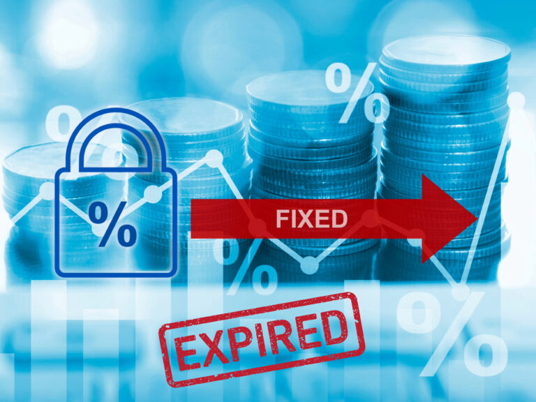 Expired fixed-rate mortgage concept with coins and percentage symbols.