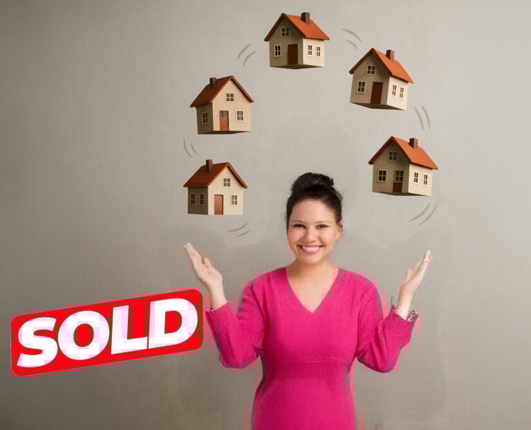 Smiling landlord celebrating the sale of multiple rental properties.