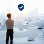 a person looking outwards at a city skyline with arrows pointing in different directions with a blue tick mark shield.