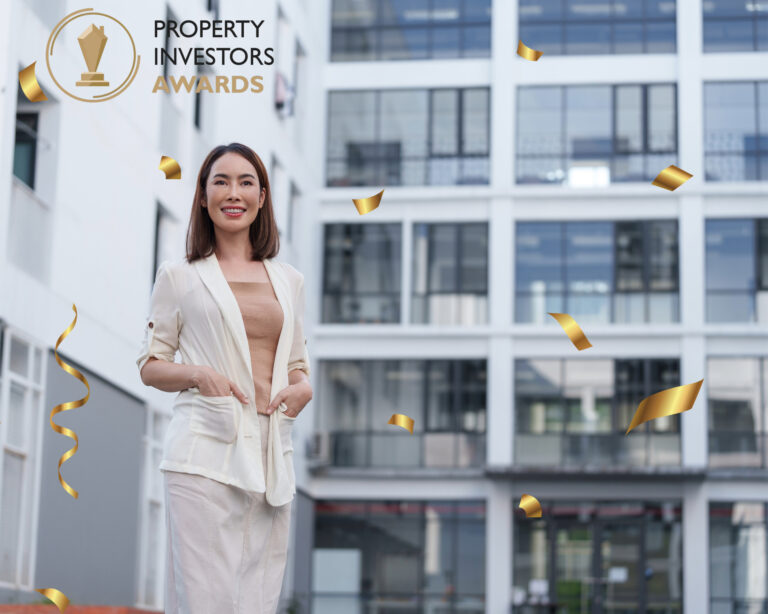 Woman outside property with confetti